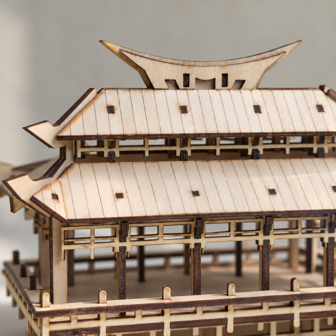 Open Gallery Wooden Temple Model Kit arranged as a warm wooden shelf display