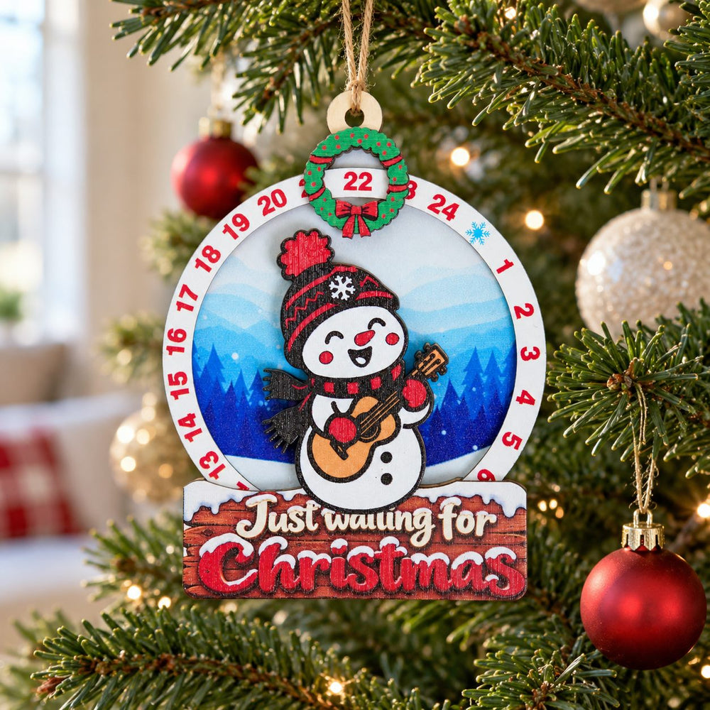 Snowman Guitar Wooden Christmas Countdown Plaque in a Christmas setting