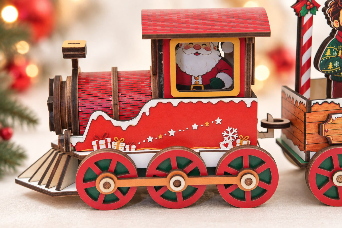 Detailed side view of the M43 engine with three spoked wheels, wooden connecting rod, slotted red boiler and Santa cab