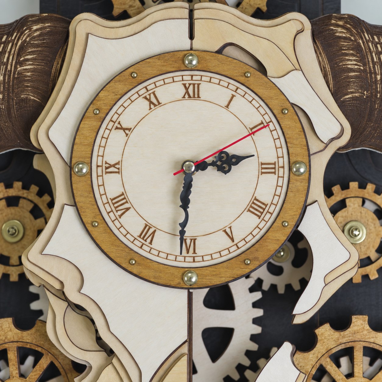 Close-up of the clock's Roman-numeral dial and three hands