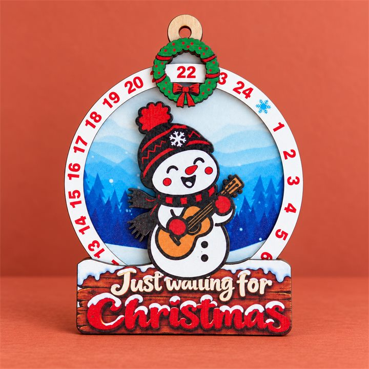Snowman Guitar Wooden Christmas Countdown Plaque on a terracotta studio background