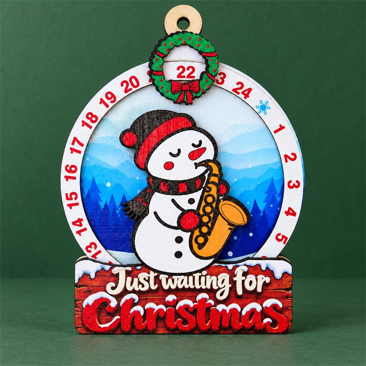Snowman Saxophone Wooden Christmas Countdown Plaque on a forest green studio background
